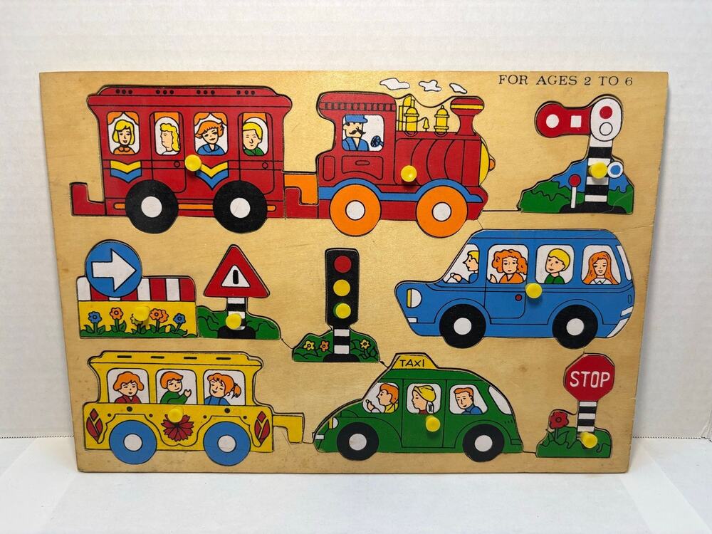 Vintage Children's Wooden Peg Puzzle
Transportation Theme Train Taxi.